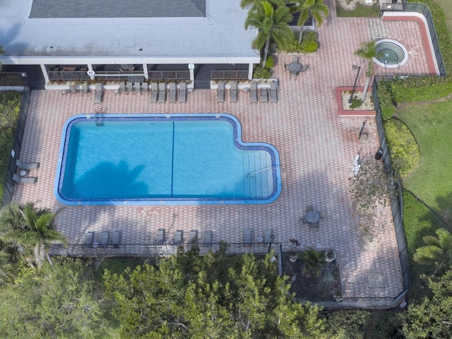 view of swimming pool with a patio