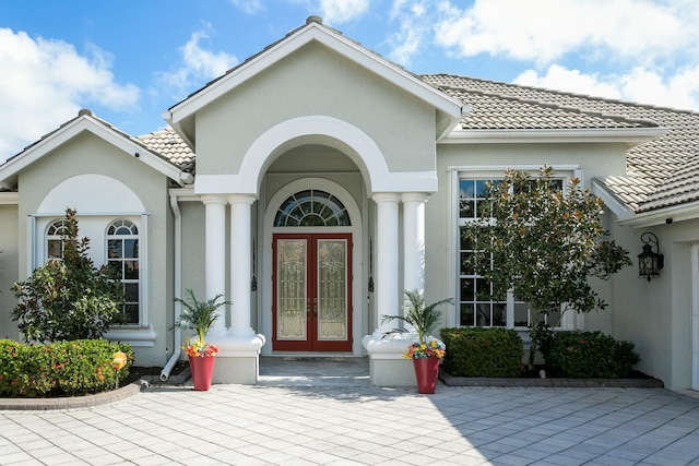 property entrance featuring french doors