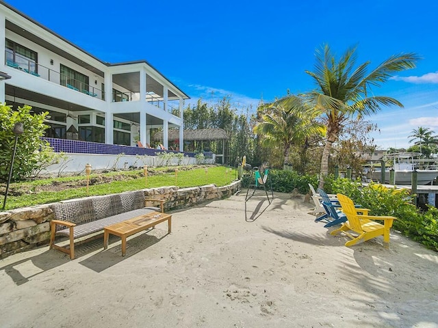 view of home's community with a patio area