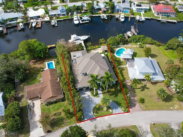 aerial view with a water view and a residential view