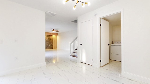 empty room with stairs, marble finish floor, washer / clothes dryer, and visible vents