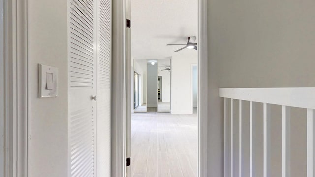 corridor with wood finished floors