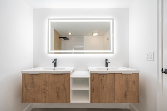 full bathroom featuring two vanities and a sink