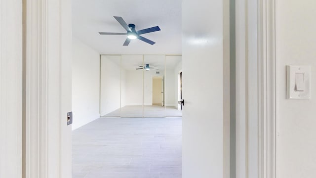 hall featuring light wood-style flooring