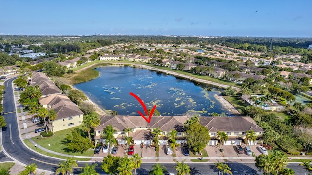 drone / aerial view with a water view