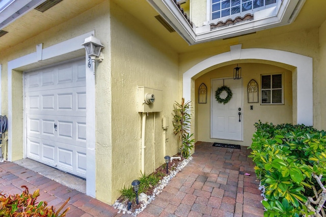 entrance to property with a garage