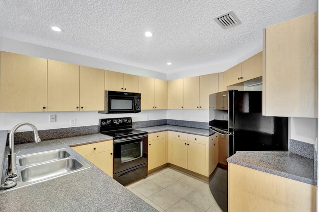 kitchen featuring black appliances, sink, a textured ceiling, light brown cabinets, and light tile patterned flooring