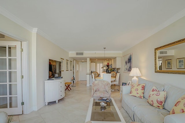 living room with ornamental molding