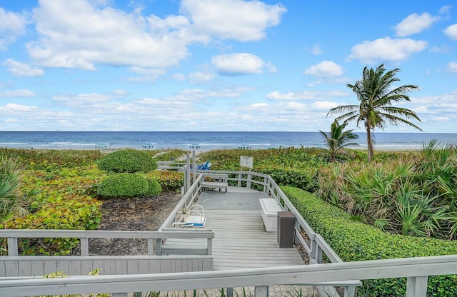 property view of water featuring a beach view