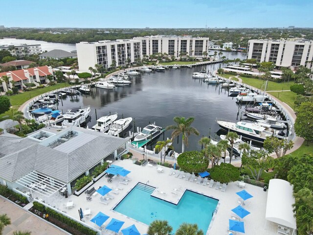 birds eye view of property featuring a water view