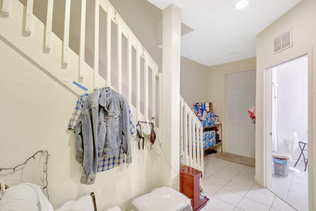 interior space featuring recessed lighting, stairs, visible vents, and light tile patterned flooring