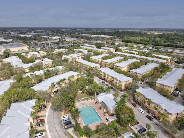 birds eye view of property with a residential view