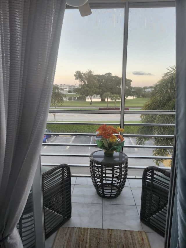 view of balcony at dusk