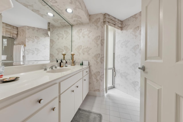 bathroom with vanity and tile patterned flooring