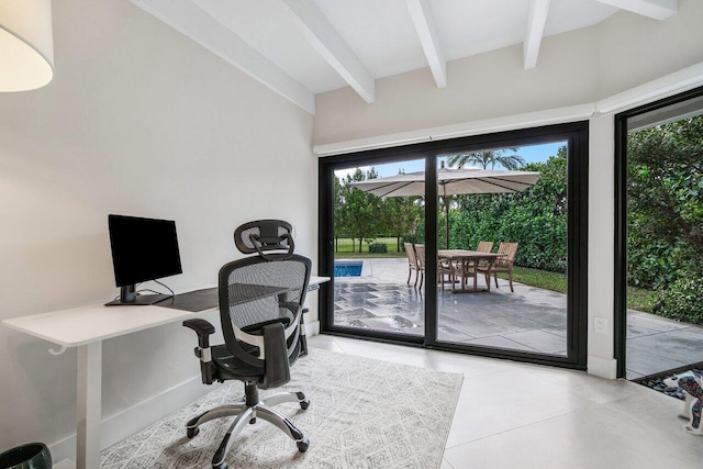 home office with light tile patterned floors and beam ceiling