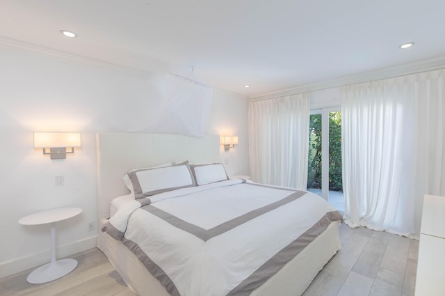 bedroom with recessed lighting, baseboards, access to outside, ornamental molding, and light wood finished floors