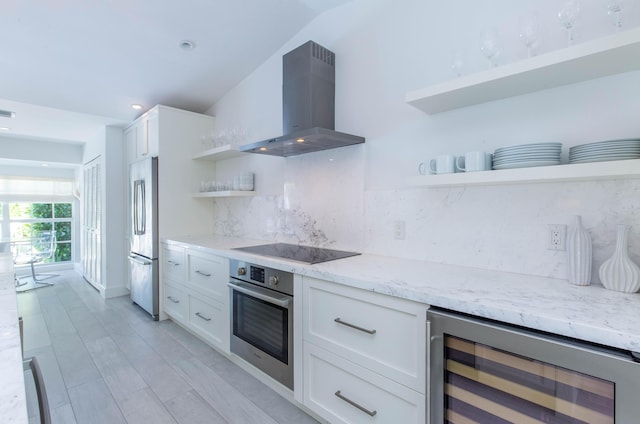 kitchen featuring beverage cooler, white cabinets, appliances with stainless steel finishes, open shelves, and exhaust hood