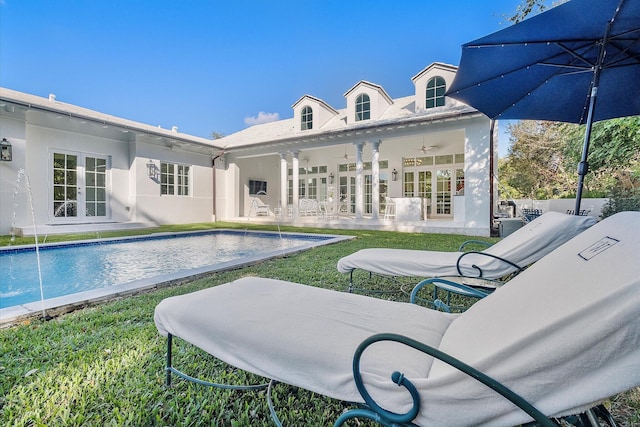 back of house featuring a patio, ceiling fan, and french doors