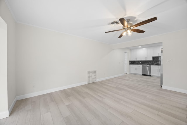 unfurnished living room with crown molding, light hardwood / wood-style flooring, and ceiling fan