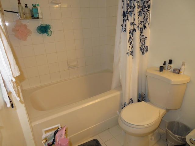 full bathroom with shower / bath combination with curtain, tile patterned flooring, and toilet