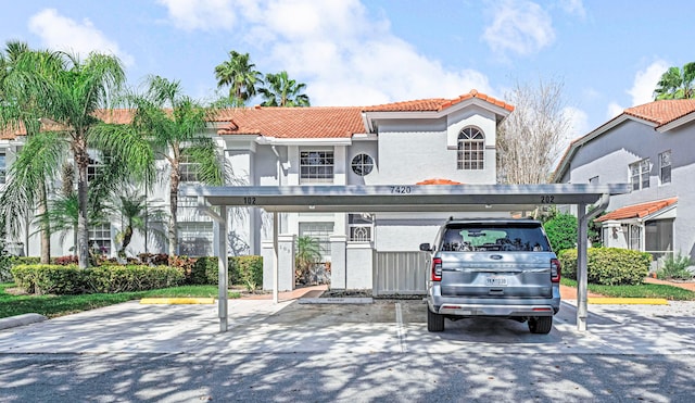 view of front facade with a carport