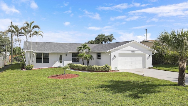 single story home featuring a garage and a front yard