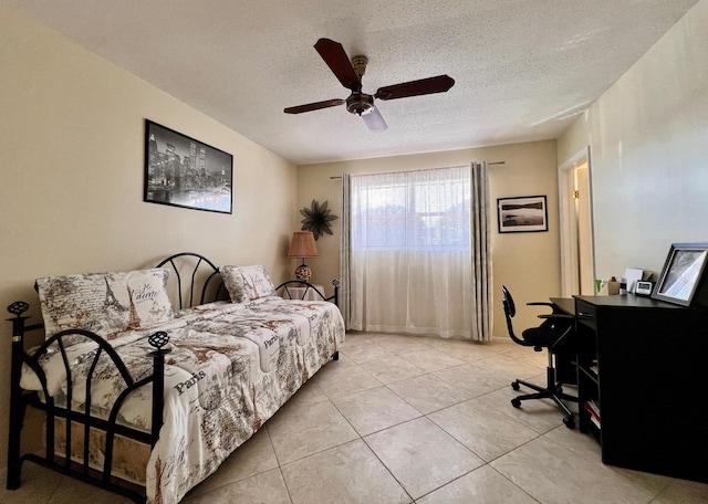 203 Oxford 100, West Palm Beach, FL 33417 - tiled bedroom with ceiling fan and a textured ceiling