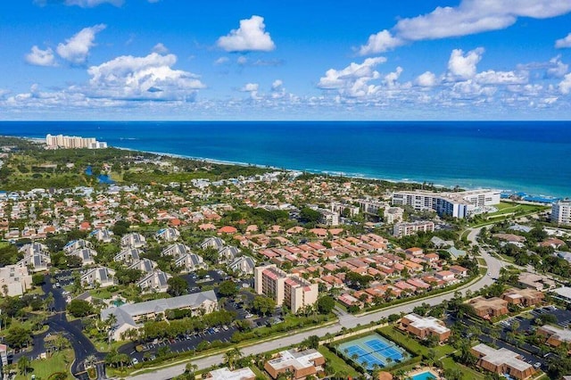 bird's eye view featuring a water view and a view of city