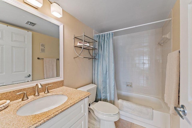 bathroom with visible vents, toilet, shower / tub combo with curtain, tile patterned flooring, and vanity