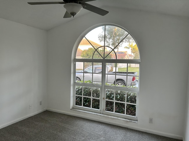 carpeted spare room with ceiling fan and a healthy amount of sunlight