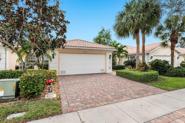 view of front of property with a garage