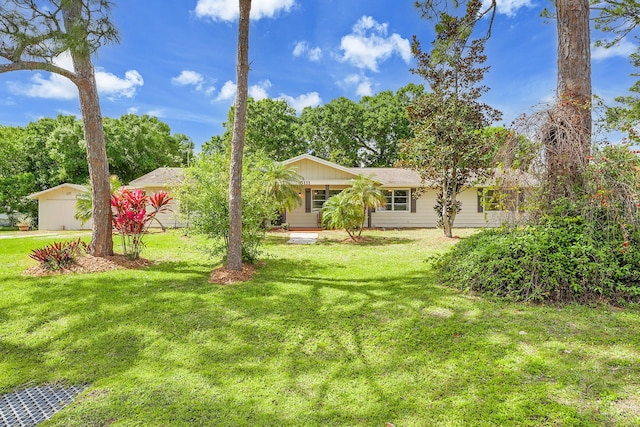 ranch-style house with a front yard