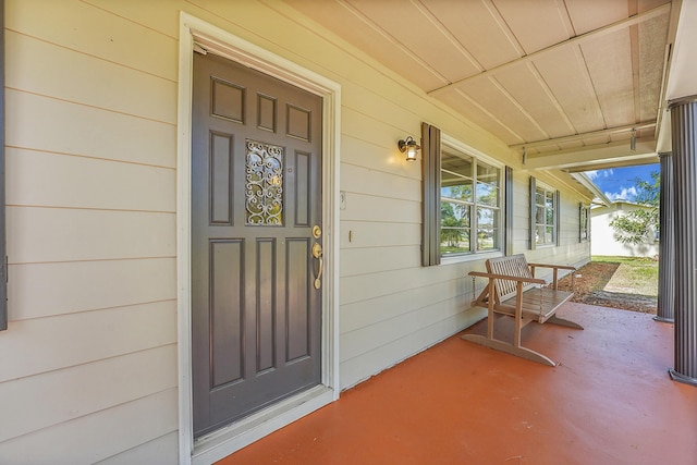 entrance to property with a porch