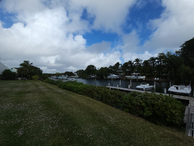 property view of water featuring a boat dock