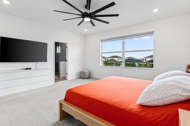 bedroom with light carpet and ceiling fan