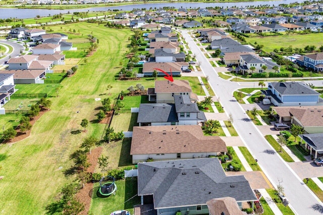 drone / aerial view featuring a water view