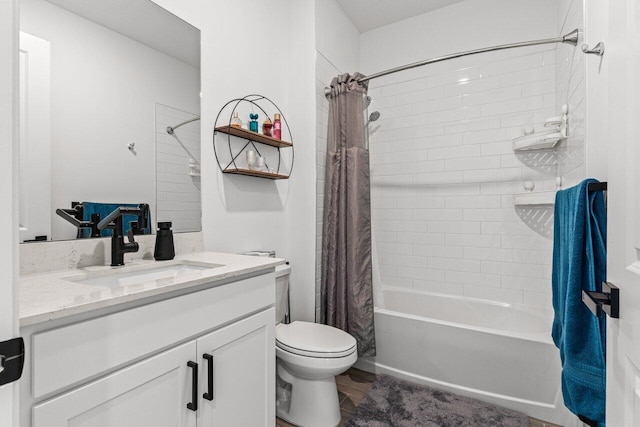 full bathroom with vanity, shower / bath combination with curtain, and toilet