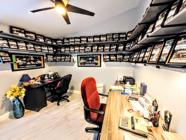 office with ceiling fan, vaulted ceiling, and hardwood / wood-style floors