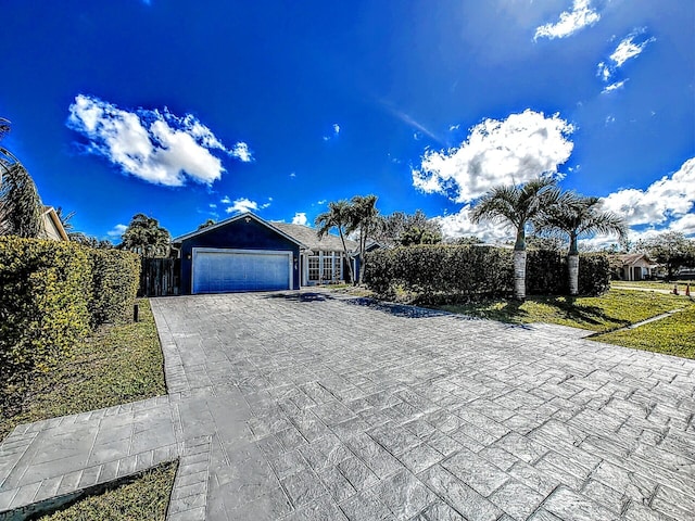 view of front of property with a garage