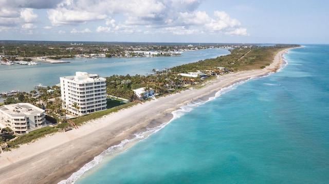 aerial view featuring a water view and a view of the beach