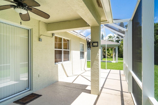 view of patio / terrace featuring visible vents, a lanai, and a ceiling fan