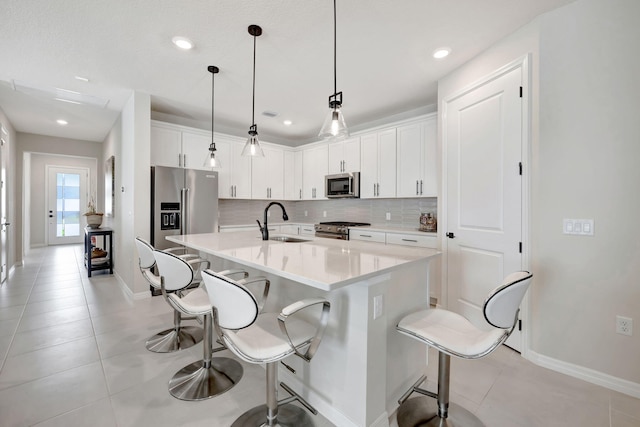 9633 Mosler Trl, Lake Worth, FL 33467 - kitchen featuring high quality appliances, backsplash, a kitchen bar, white cabinetry, and recessed lighting