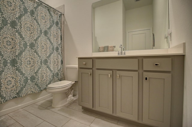 full bath featuring shower / bath combination with curtain, tile patterned flooring, vanity, and toilet