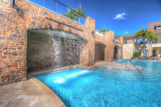 pool featuring a patio area