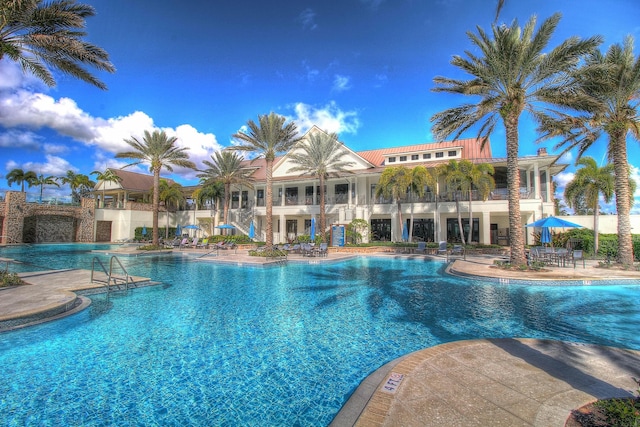 pool with a patio area