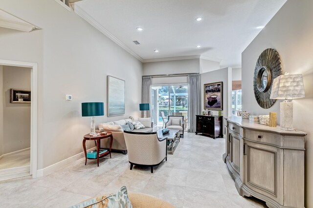 tiled living room featuring ornamental molding