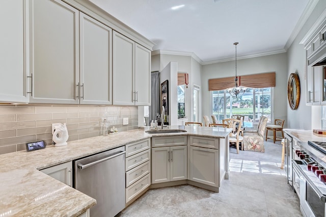 kitchen with appliances with stainless steel finishes, tasteful backsplash, sink, hanging light fixtures, and light stone counters