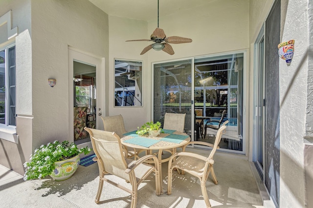 sunroom / solarium with ceiling fan