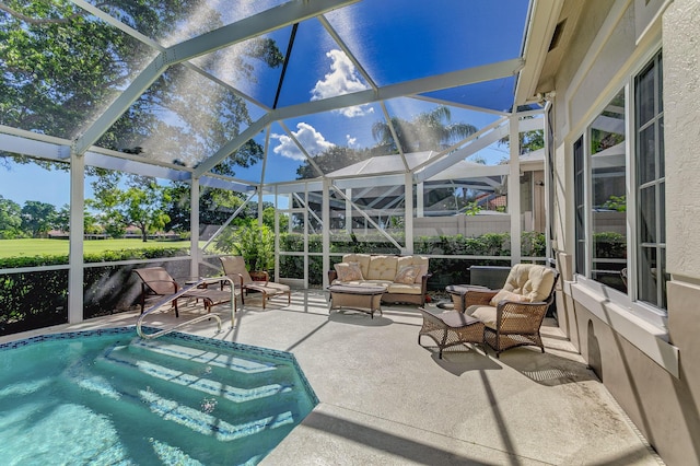 view of pool with an outdoor living space, a patio, and a lanai