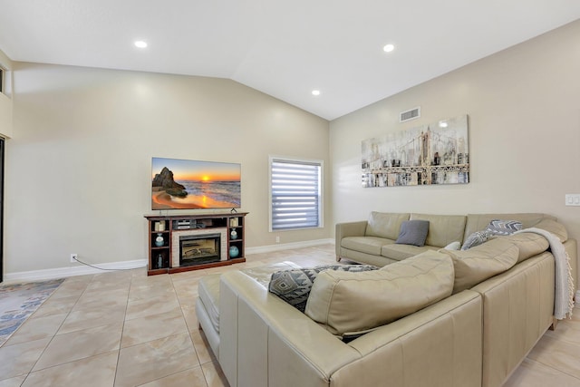 tiled living room with vaulted ceiling